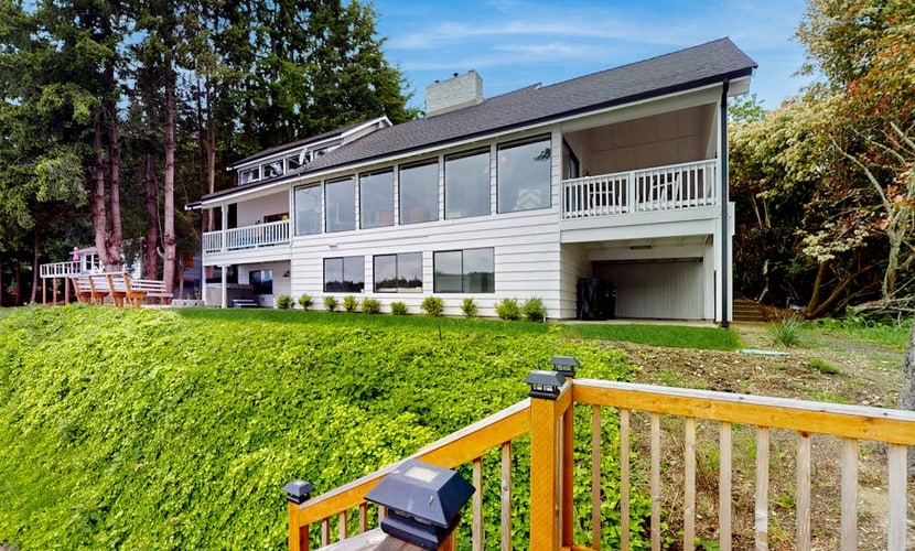 Waterfront home with hot tub, deck pool table and firepit