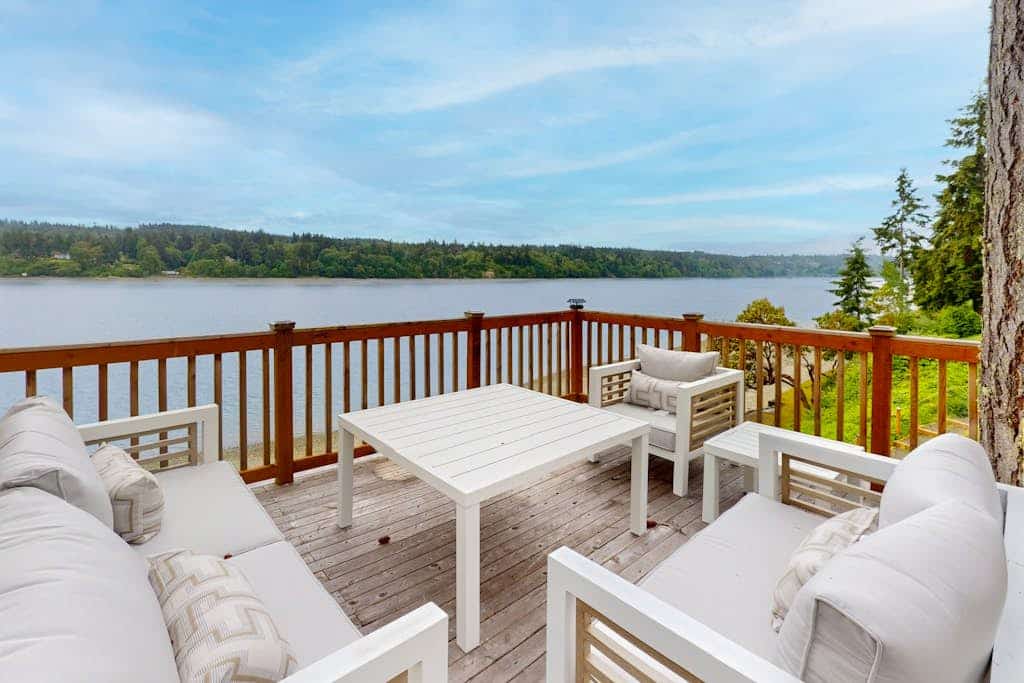 Waterfront home with hot tub, deck pool table and firepit