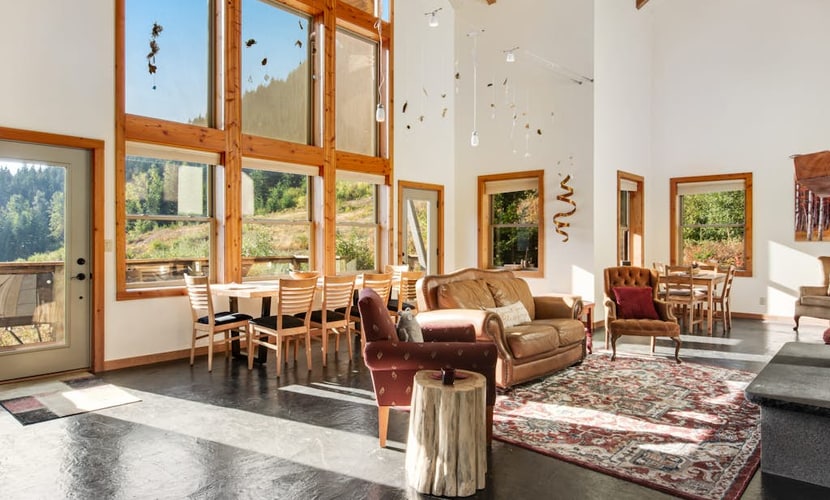 Ski-in/ski-out home with mountain-view balcony, multiple living areas, & W/D