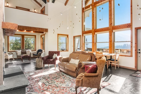 Ski-in/ski-out home with mountain-view balcony, multiple living areas, & W/D