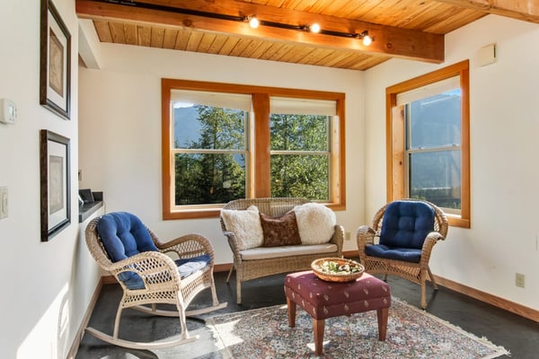 Ski-in/ski-out home with mountain-view balcony, multiple living areas, & W/D