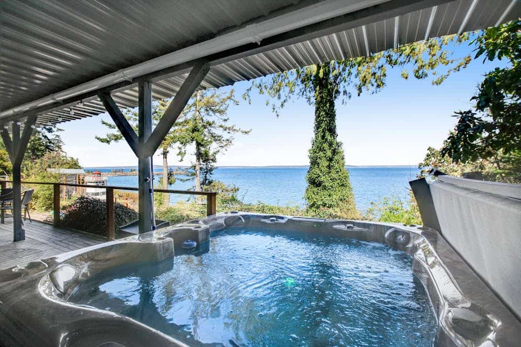 Impeccable views of the Sound complete with hot tub & pool table