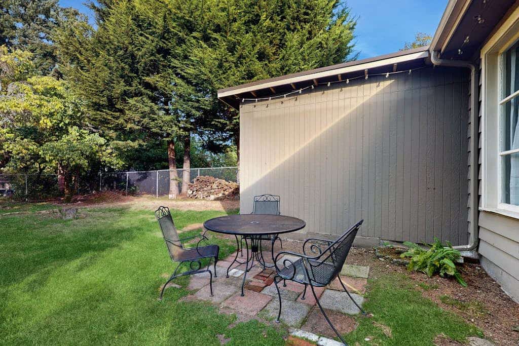 Serene single-level home with piano, patio & creative spaces