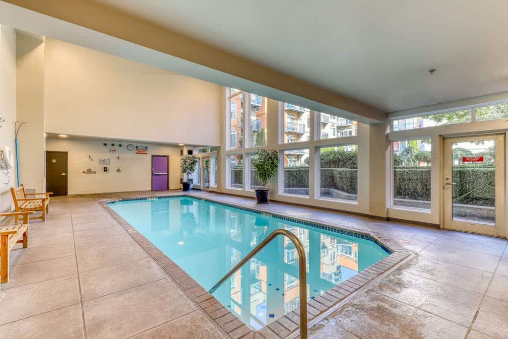 Downtown condo with private patio and shared hot tub, dog friendly amenities