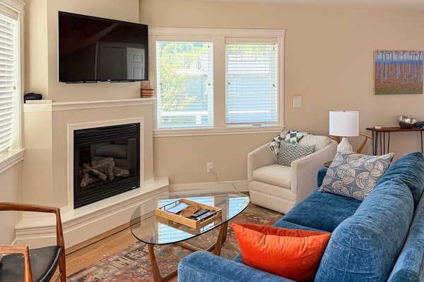 Centrally located waterfront home with ocean view, home office, grill, fireplace