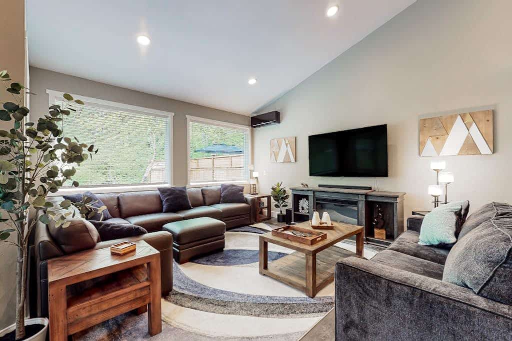 Inviting riverfront home with hot tub, firepit, W/D, & dog-friendly