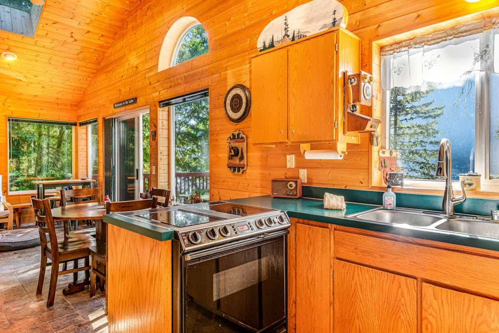 Lakefront home with stunning views, private hot tub, dock & 2-story deck