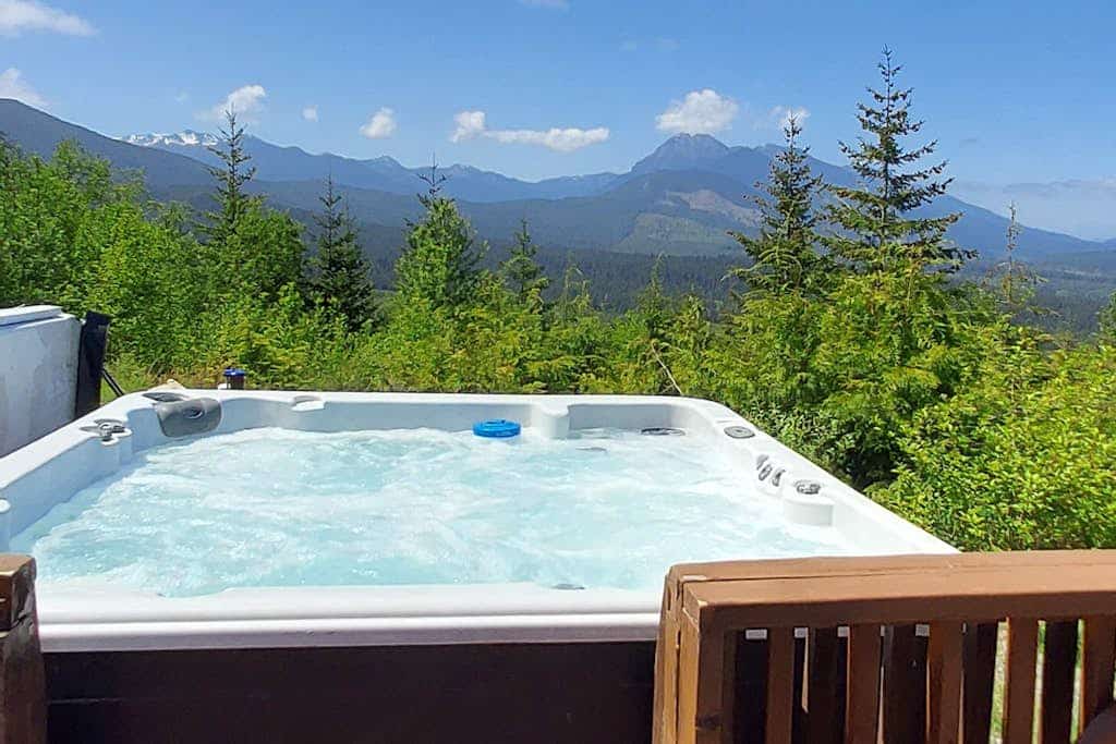Spacious house w/mountain views, bunkhouse & hot tub—dogs welcome