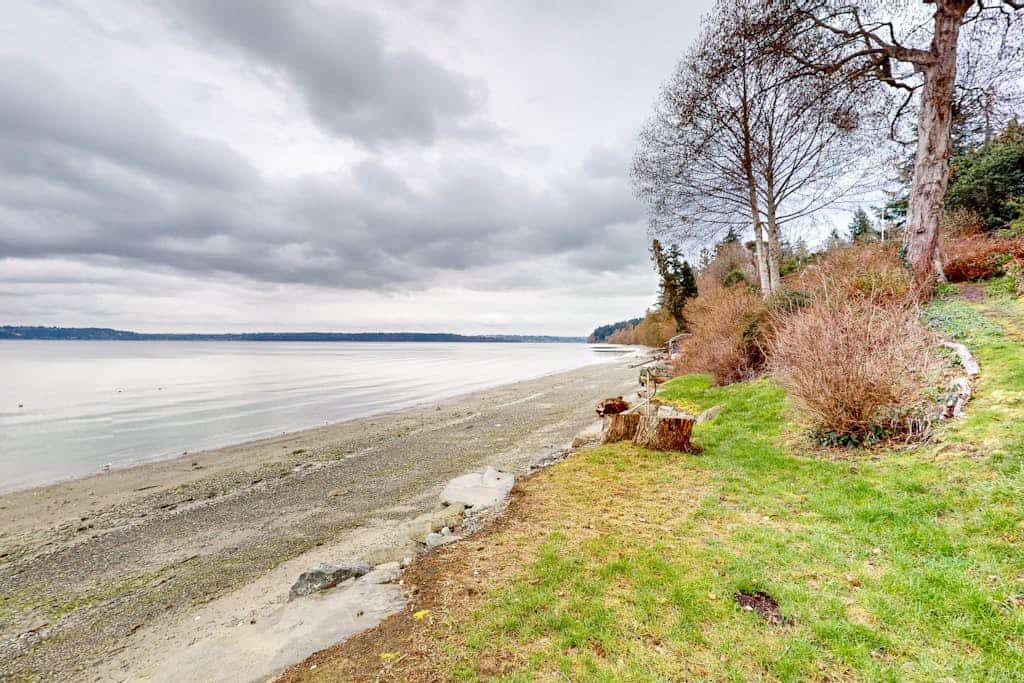 Stunning waterfront escape with patio, beach access, & gorgeous bay views
