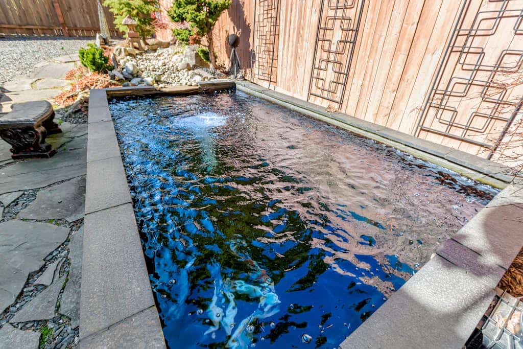 Custom lakefront gem with private dock, hot tub, firepit, & chef's kitchen