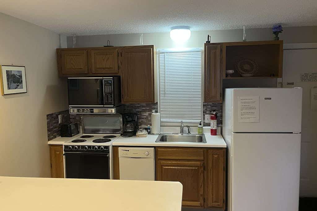 Condo with WiFi, private beach, full kitchen, & outdoor pool