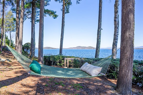 Lakeside cottage with Lake Winnipesaukee views & private boat dock, dog-friendly