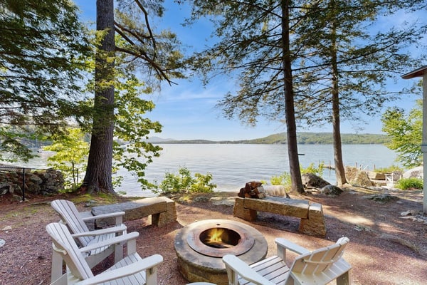 Captivating lakefront home with private dock, row boat, firepit, and lake views