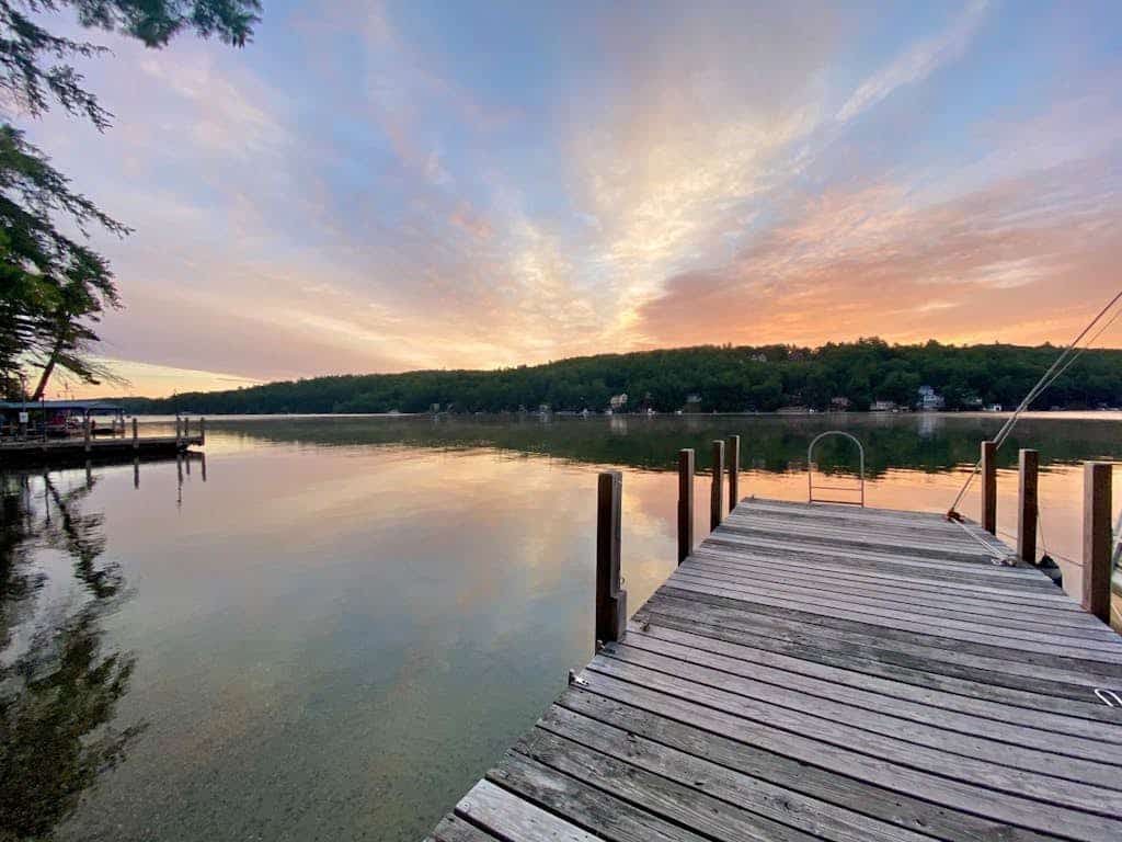Lakefront home with deck, game room, washer/dryer, grill, dock, & views