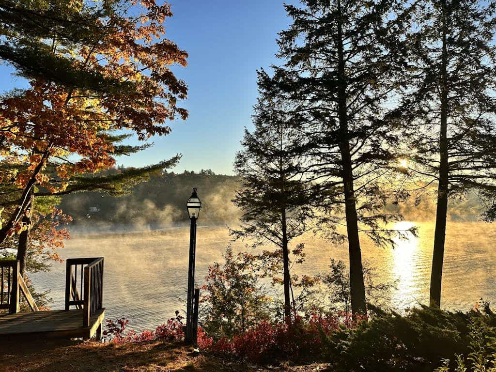Lakefront home with deck, game room, washer/dryer, grill, dock, & views