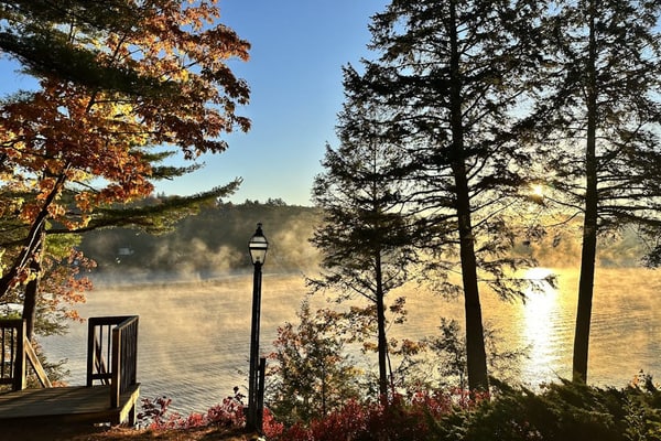 Lakefront home with deck, game room, washer/dryer, grill, dock, & views