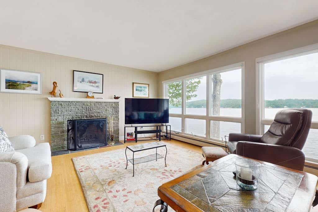 Lakeside paradise w/ lakefront deck, enclosed porch, 2 docks & large lawn