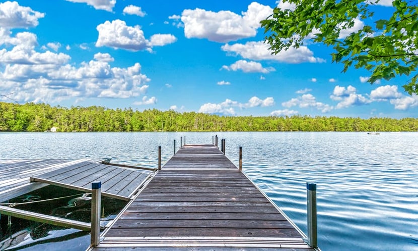 Charming lakefront cabin with private dock, deck & screened porch