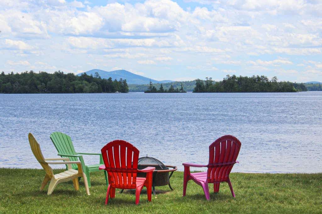 Dog-friendly waterfront cottage with private dock, community beach, grill, W/D