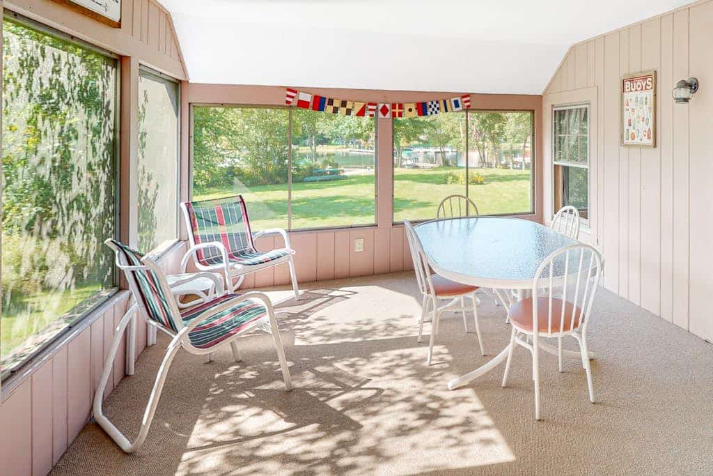 Dog-friendly waterfront cottage with private dock, community beach, grill, W/D