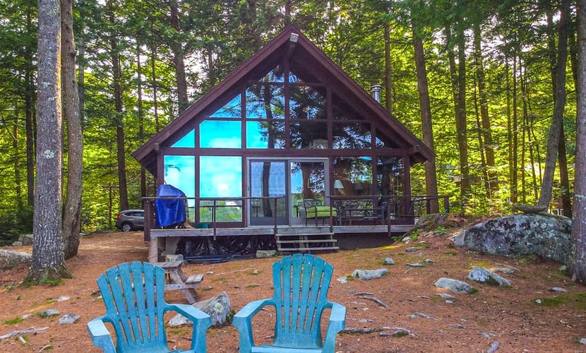 Chalet-style lakefront home with private dock, beach, kayak, canoe & epic view
