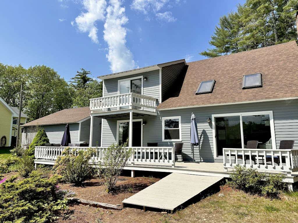 Two updated lakefront homes - dock with boat slip, game room, & screened porch