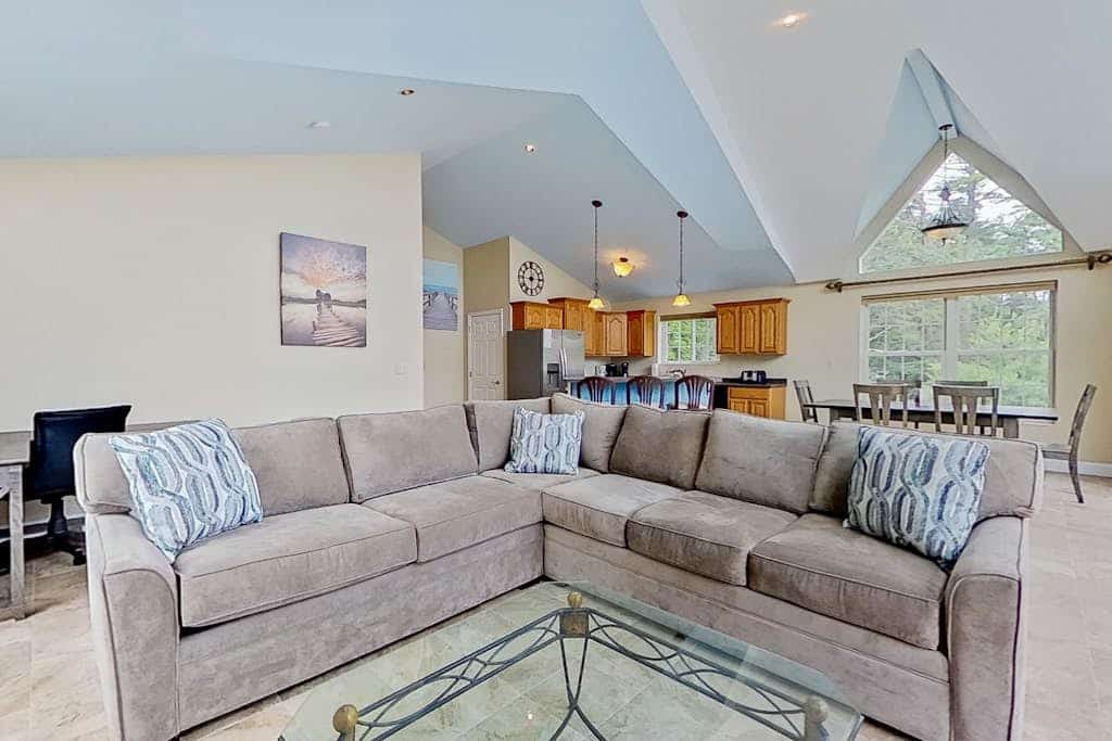 Leaward Shores Guesthouse | Lake view home in Moultonborough with dock & deck