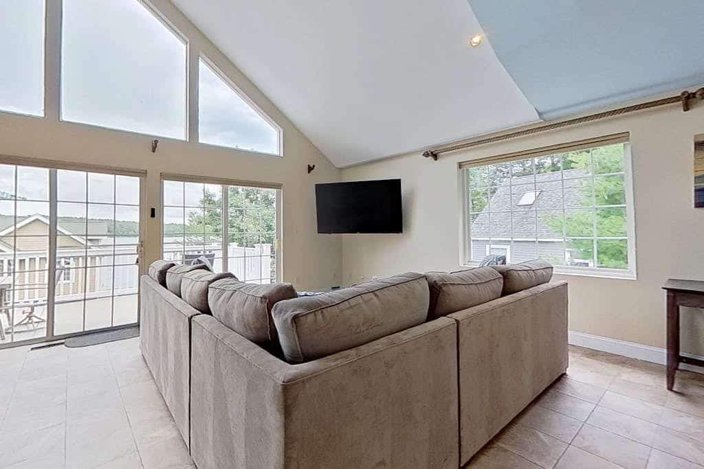 Leaward Shores Guesthouse | Lake view home in Moultonborough with dock & deck
