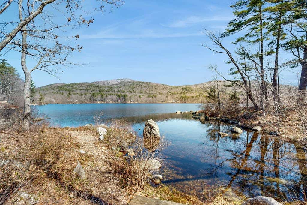 Pond & mountain view cabin with fireplace, workstation, W/D, deck, & internet