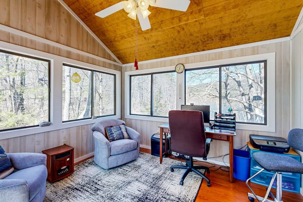 Pond & mountain view cabin with fireplace, workstation, W/D, deck, & internet
