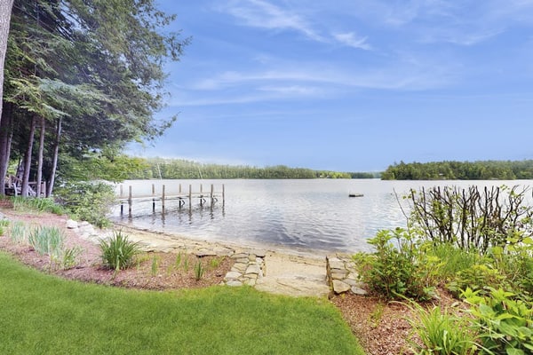 Spectacular lakefront home w/ private dock, beach, swim platform, gazebo & porch