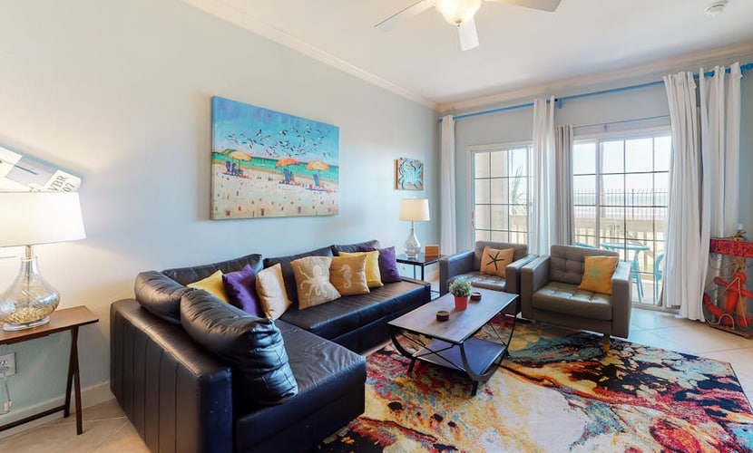 Gulf view condo with pools, fitness center, private patio, & beach access