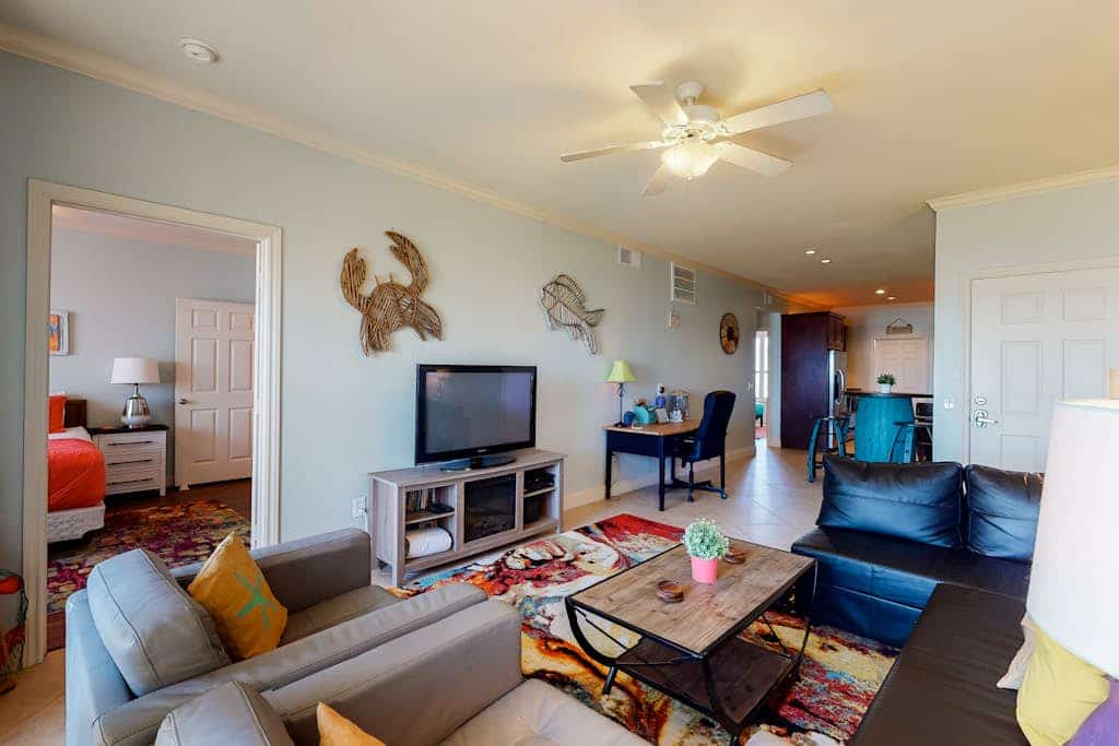 Gulf view condo with pools, fitness center, private patio, & beach access