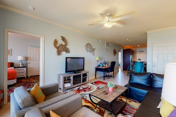 Gulf view condo with pools, fitness center, private patio, & beach access