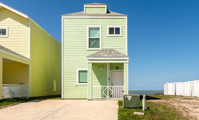 Bright Waterfront Home with Shared Pool, Water View, and High-Speed WiFi