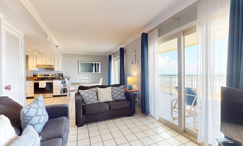 Waterfront gem with balcony, pool & hot tub - steps to beach