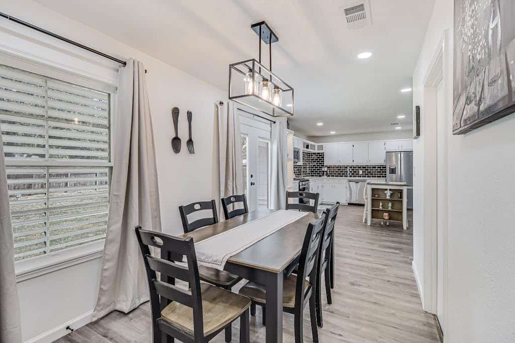 Inviting house with large enclosed yard, central AC, washer/dryer, & golf nearby
