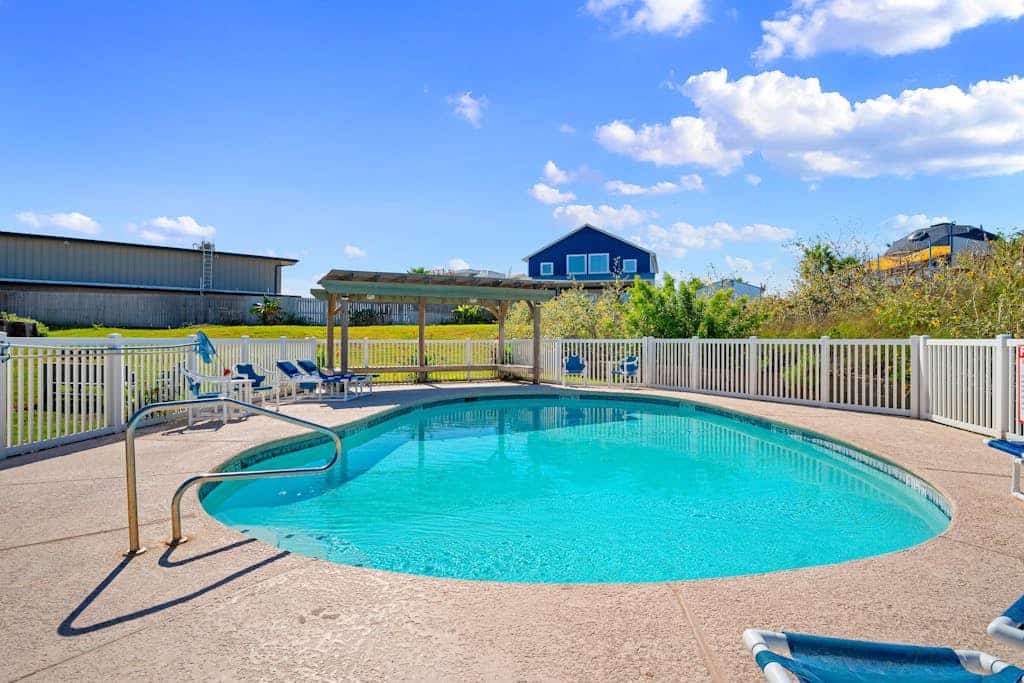 Gulf Coast condo with a pool & a furnished patio - short walk to the beach