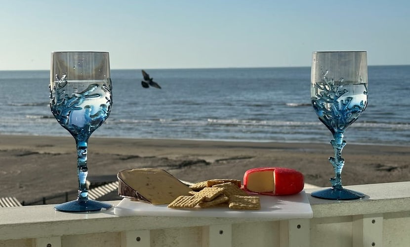 Gulf-view condo in beachfront complex with balcony, pool, hot tub, & central AC