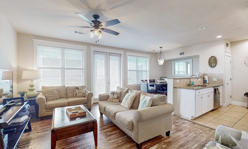 Pointe West getaway with pool, hot tub & bay-view balcony - walk to beach