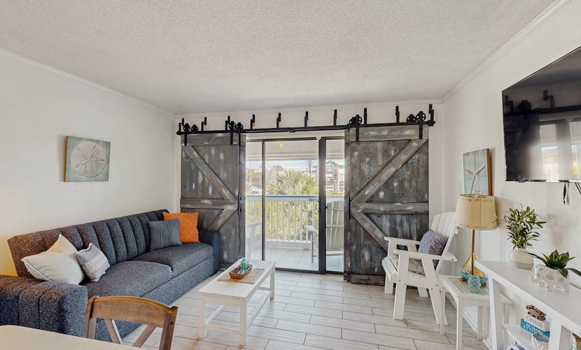 Cute condo with shared pool, private balcony & great location