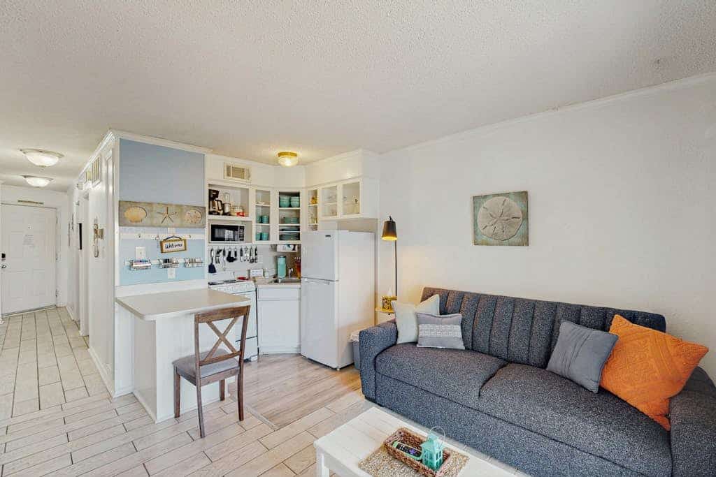 Cute condo with shared pool, private balcony & great location
