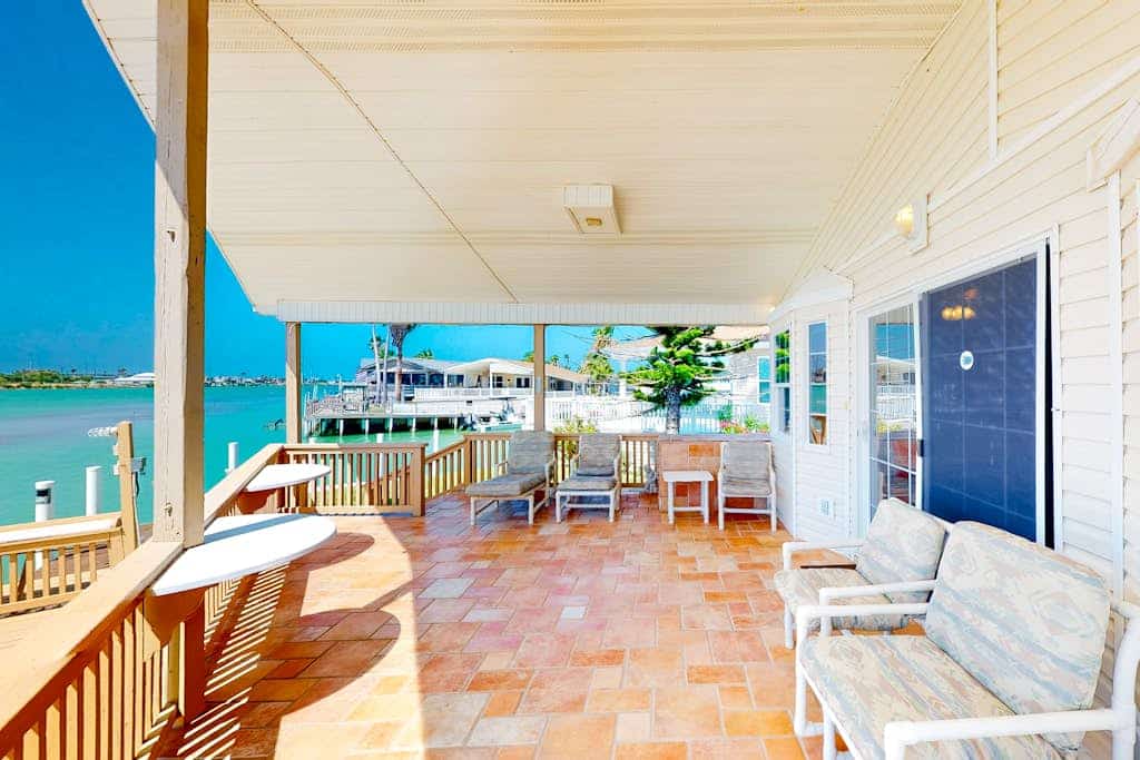 Gorgeous Intercoastal waterfront home on channel w/shared pool, hot tub, & dock