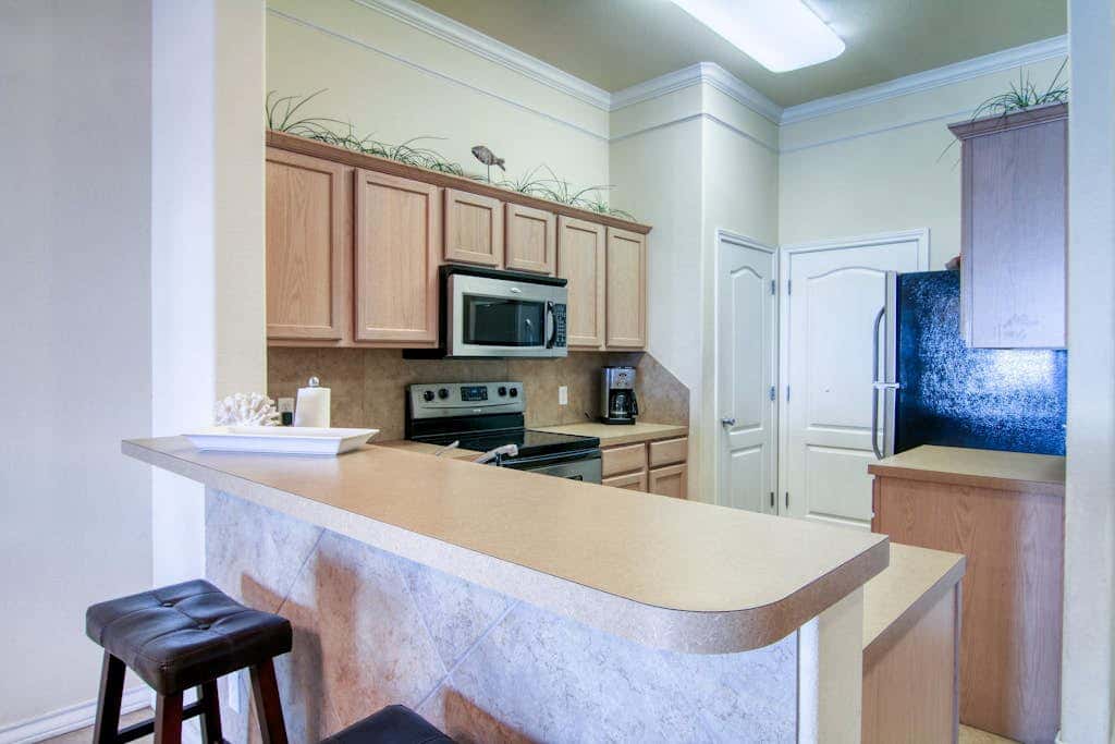 Palm Bay 202 - Heated Pool, BBQ & Beach Access