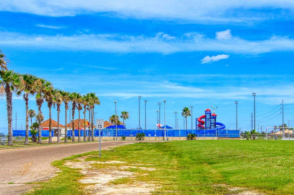 Palm Bay 202 - Heated Pool, BBQ & Beach Access