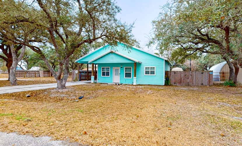 Coastal hideaway with fenced yard, firepit, central AC, & W/D - dog-friendly