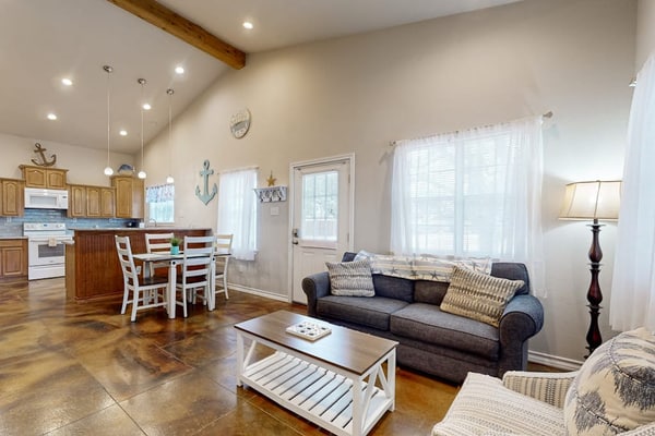 Coastal hideaway with fenced yard, firepit, central AC, & W/D - dog-friendly