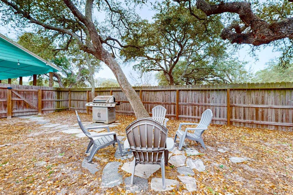 Coastal hideaway with fenced yard, firepit, central AC, & W/D - dog-friendly
