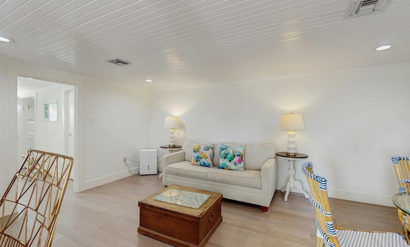 Dog-friendly house with Gulf view, firepit, sundeck, enclosed yard & central AC