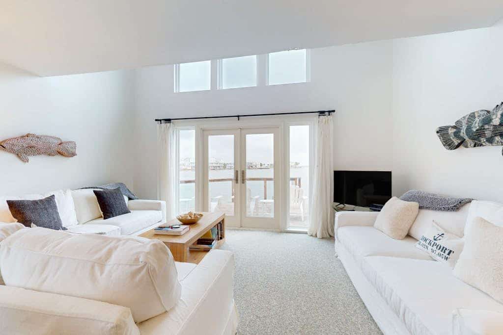 Designer waterfront townhome with pool & dock access, amazing views